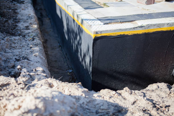 Professional Waterproofing technician working in Beverly, NJ